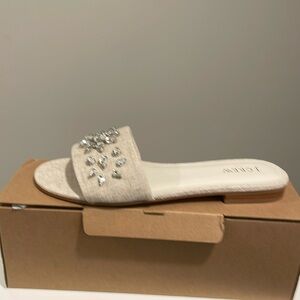 Beautiful cream and gold sandals that you justy slide your feet in.